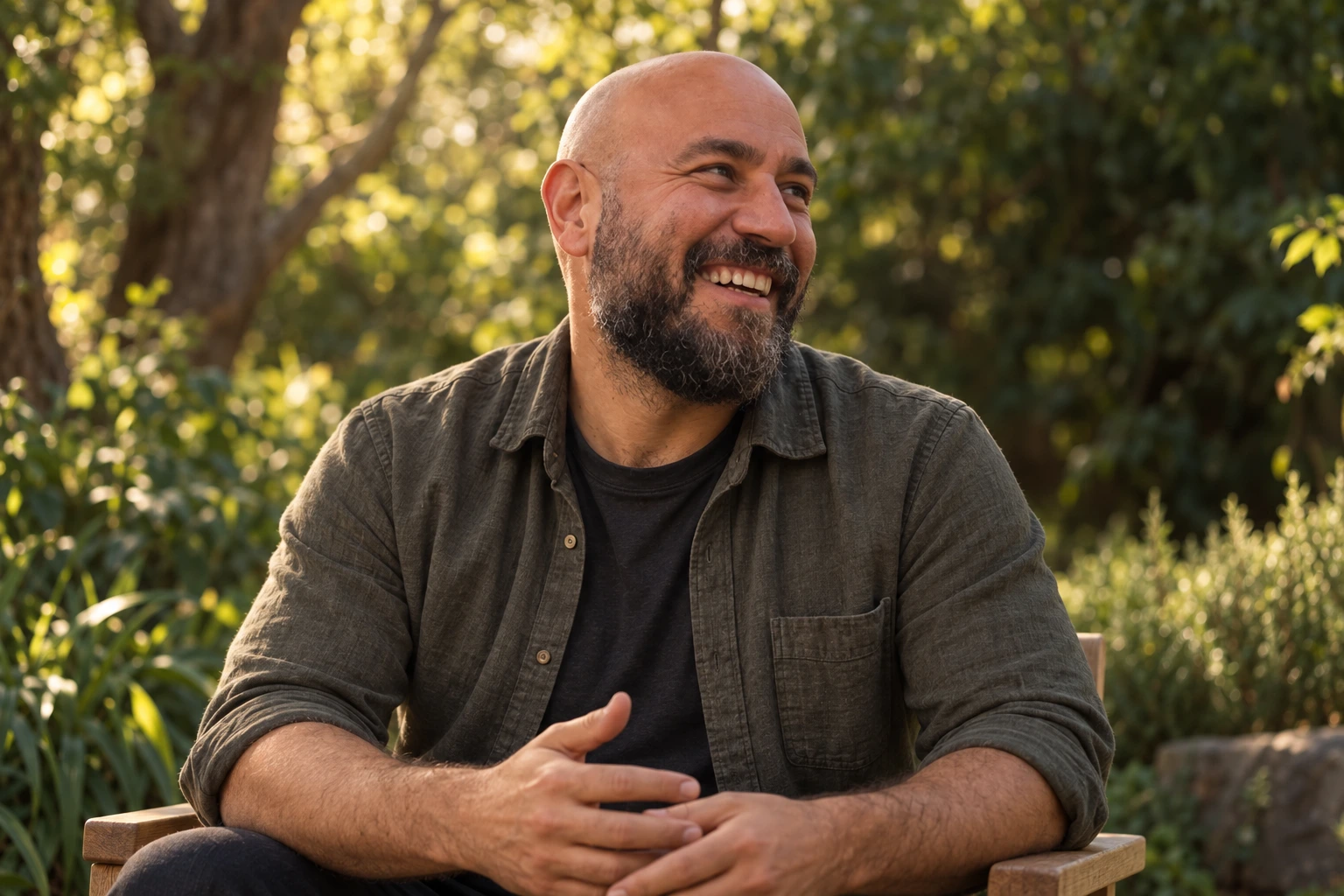 AI-created portrait of Fooji seated in a leafy garden, listening with a relaxed smile