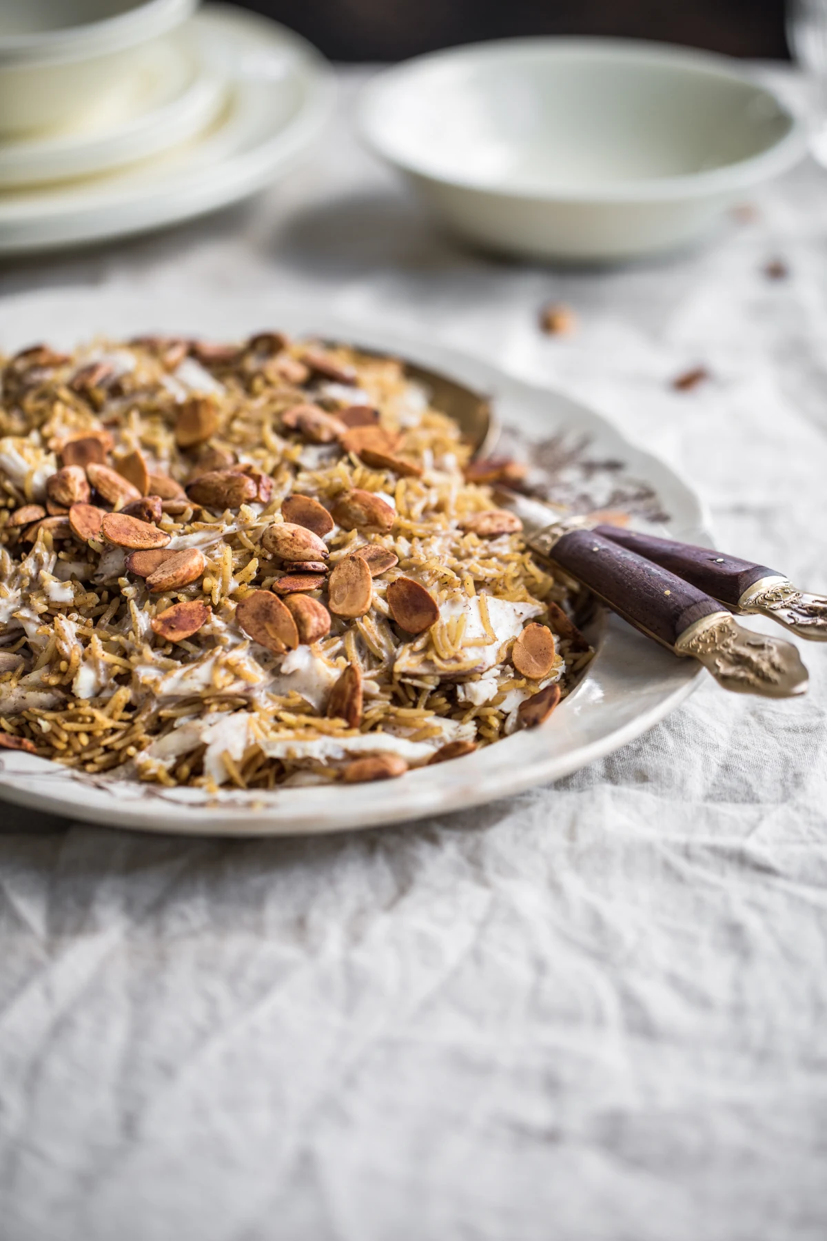 Rice garnished with almonds
